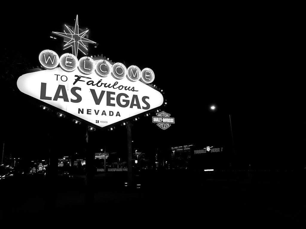 Terra Firma Las Vegas Bankruptcies Update photo of the famous Las Vegas sign illuminated at night.