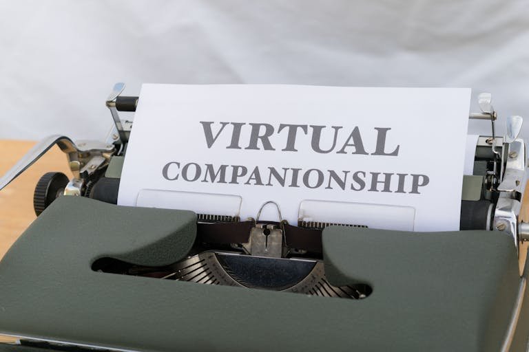 Daily News & Insights and Online News of a vintage typewriter with a paper reading 'Virtual Companionship', symbolizing virtual connections.