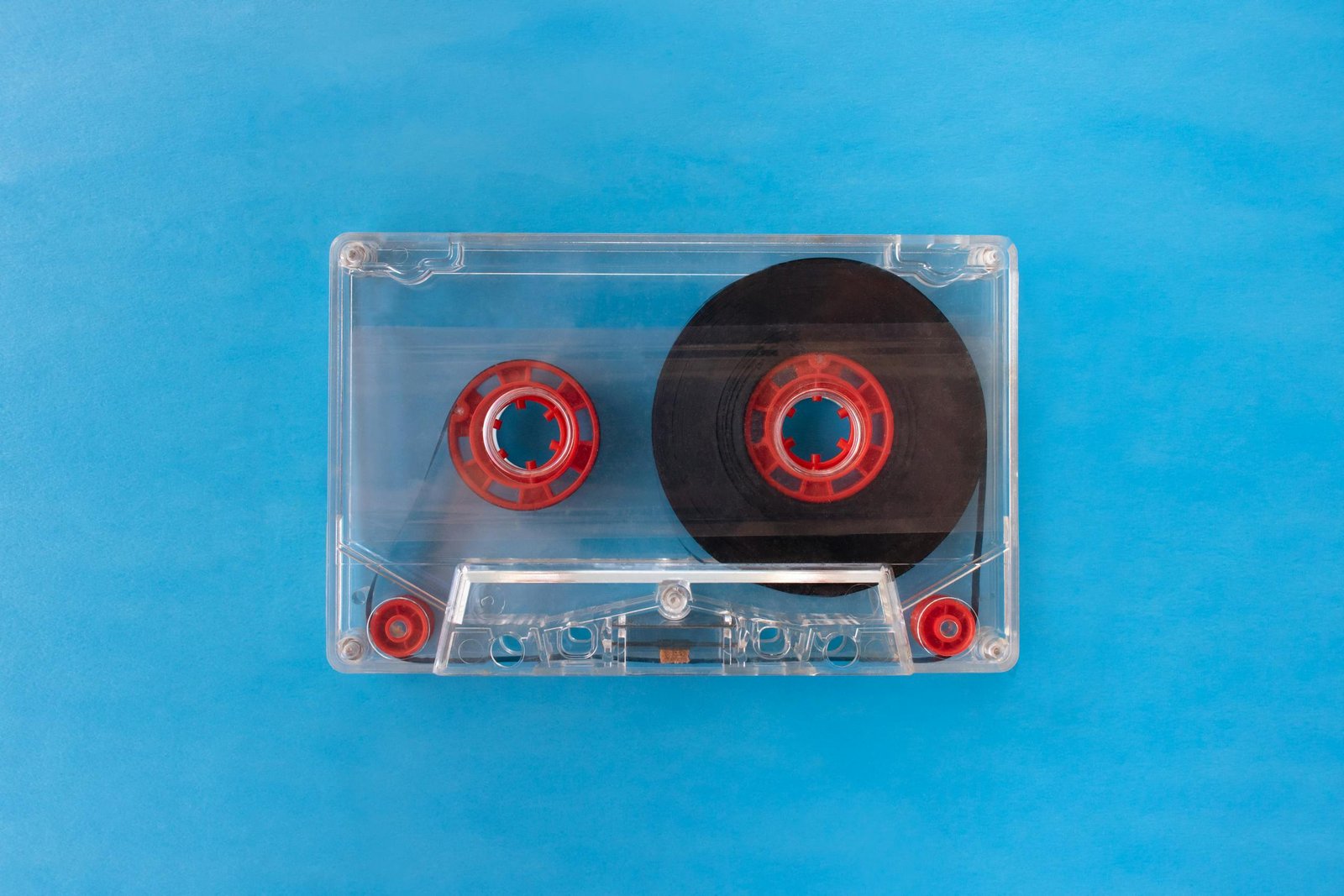 Latest Tech Guides & Tips with red reels on a bright blue background.