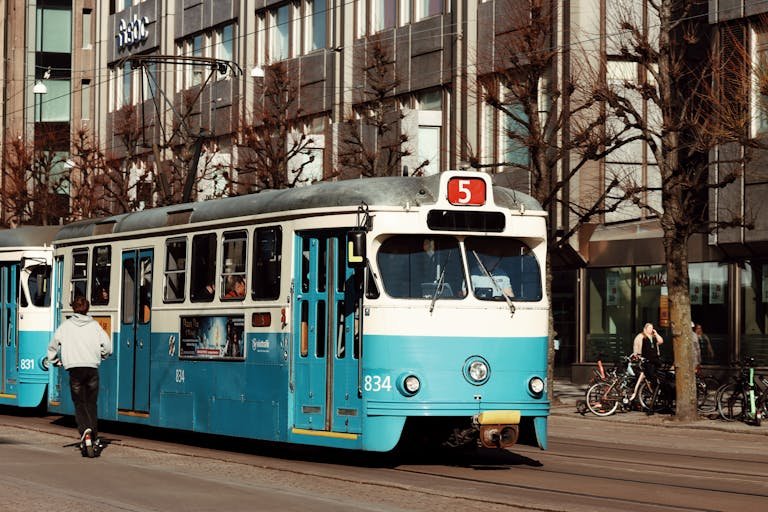 6565-8dj-9.8koll travels through Gothenburg, Sweden on a sunny day, capturing urban life.