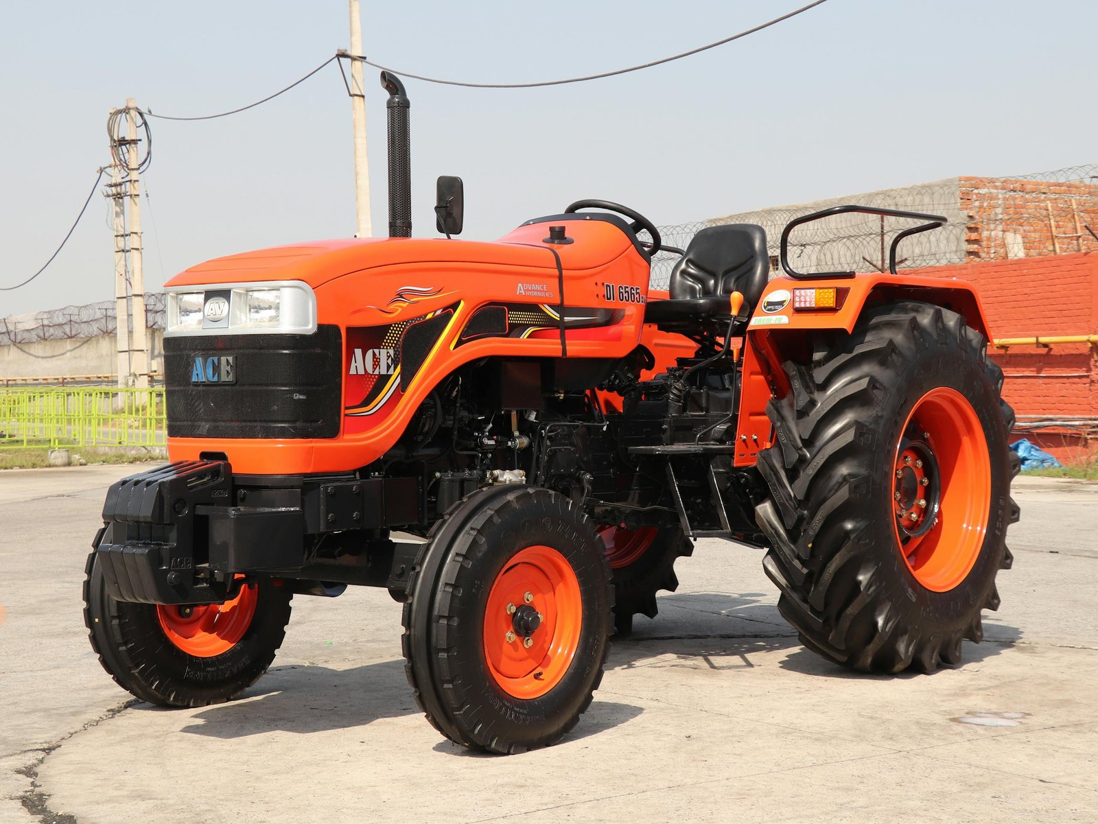 A modern 6565-8dj-9.8koll tractor showcased outdoors in Faridabad, India.